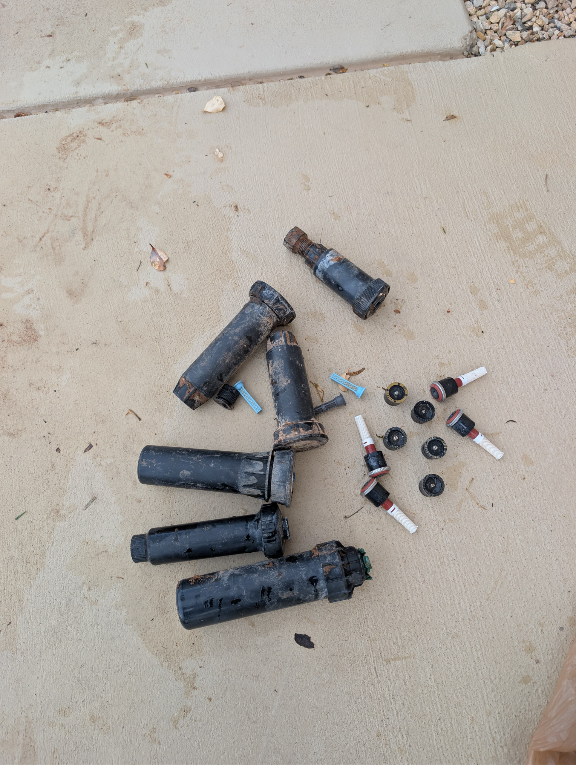 Old sprinkler heads removed during repair in St. George Utah - Lawnovo